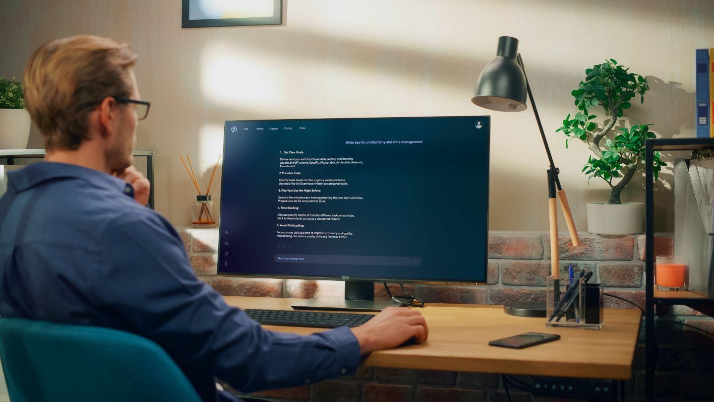 Man working on computer.