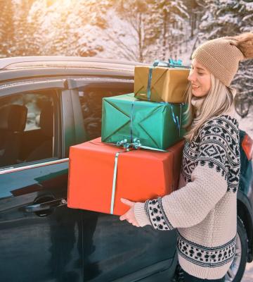 A woman carrying gifts.