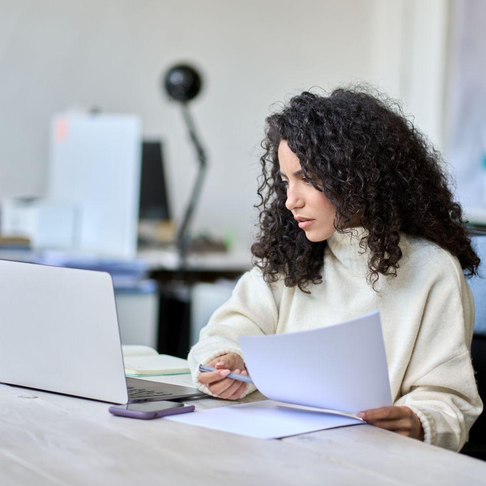 A woman working on laptop.